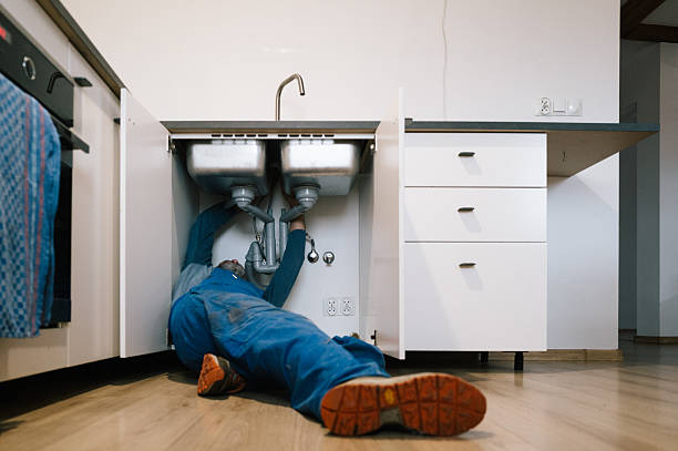Professional Drain Cleaning technician working in New Virginia, IA